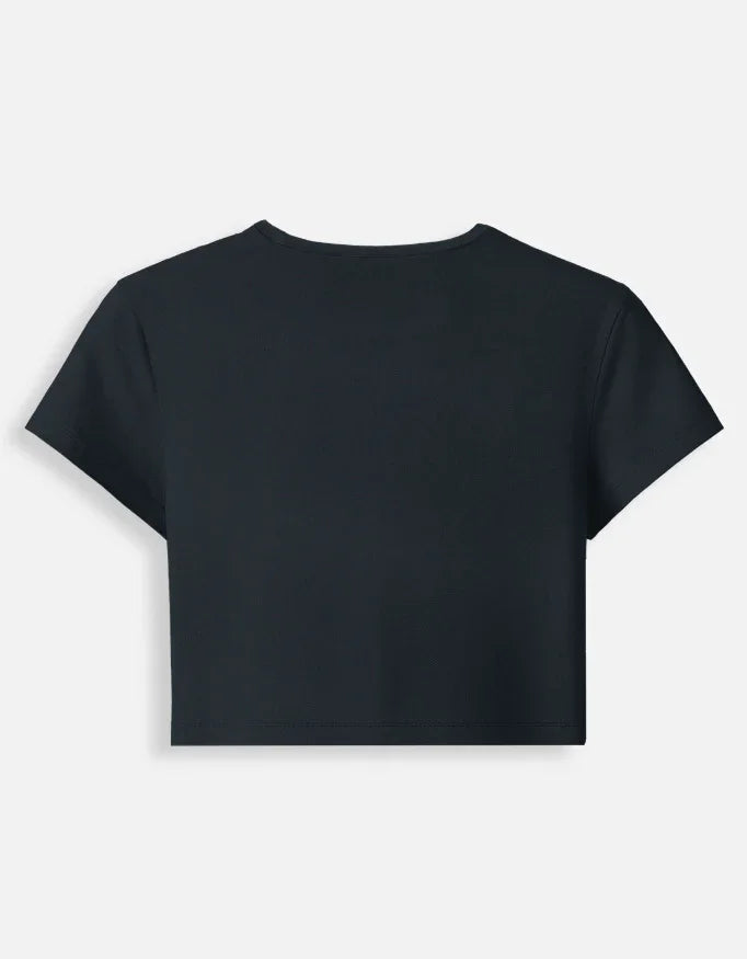 Back view of a black cropped T-shirt with short sleeves, Nairove Closet fashion