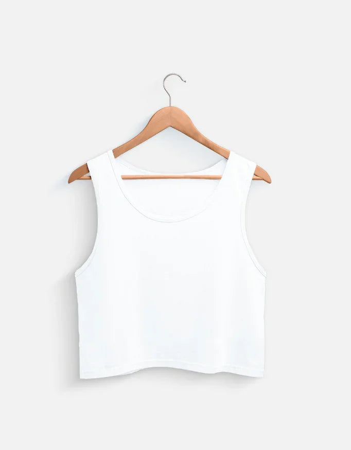 White sleeveless crop top on wooden hanger, Nairove Closet fashion basics collection