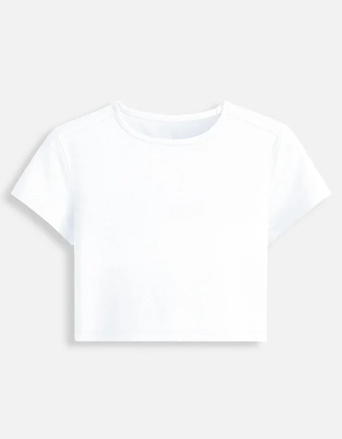 White cropped short sleeve t-shirt on plain background from Nairove Closet collection